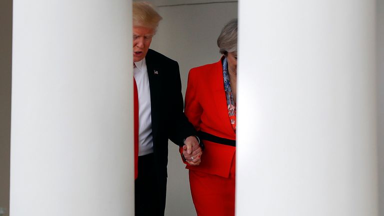 Donald Trump held Theresa May's hand at the White House in 2017